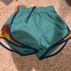 Nike blue and red stripe dislike Brownlee fish awesome blue yellow orange